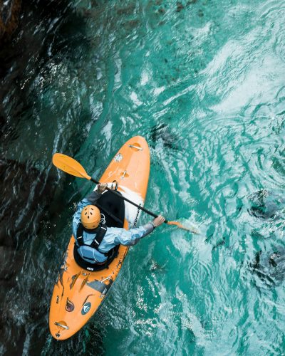 Company Retreat Kayaking or Paddleboarding Along the Cliffs